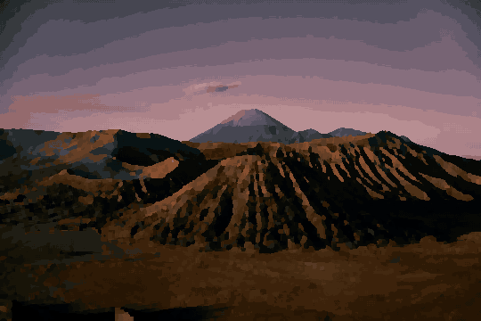 A stunning view of Mount Bromo in Indonesia at sunset, with the sky in the background illuminated in a beautiful array of oranges, pinks, and purples, pixel art