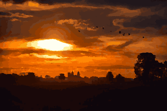 A flock of birds flying over a field at sunset, with trees in the foreground and a building in the background, pixel art