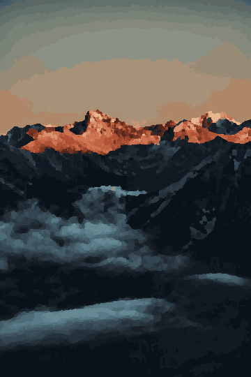 A majestic mountain range with snow-capped peaks in the background, illuminated by the setting sun, pixel art