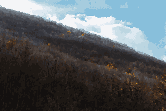 A hillside with trees in the foreground and a sky with clouds in the background, pixel art