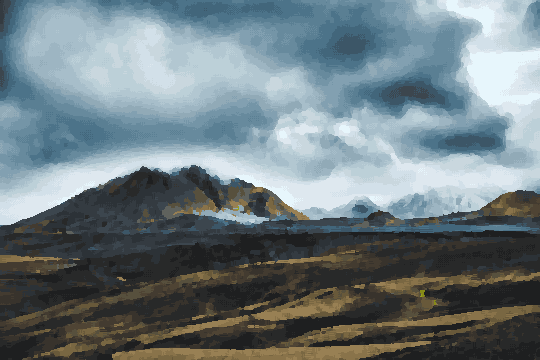A mountain range with snow-capped peaks in the background, surrounded by lush green grass and a sky filled with white, fluffy clouds, pixel art