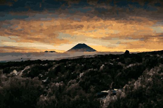 A majestic mountain in the middle of a field at sunset, surrounded by lush green grass and plants, pixel art
