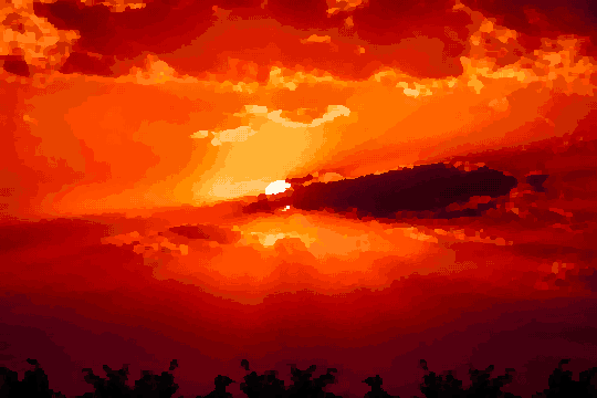 A beautiful sunset with the sun setting behind the clouds in the sky, casting a warm orange glow over the trees in the foreground, pixel art
