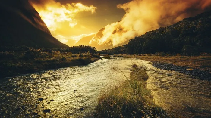 Sunset Over River In Lush Green Valley wallpapers