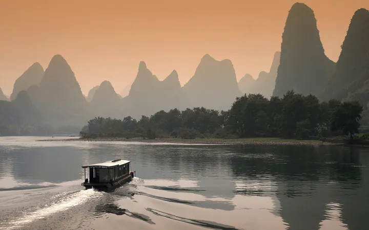Boat On Lake With Sunset Glow — original wallpaper