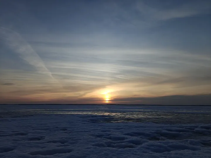 Frozen Lake Sunset in Finland wallpapers