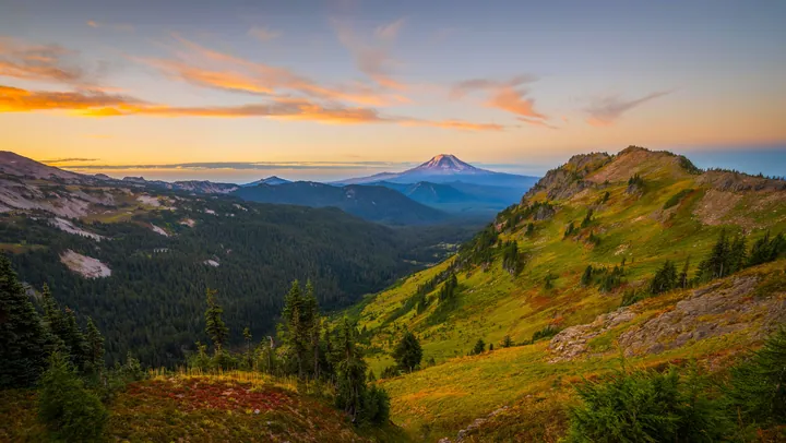 A stunning view of Mount Hood at sunset from the top of a mountain in Oregon