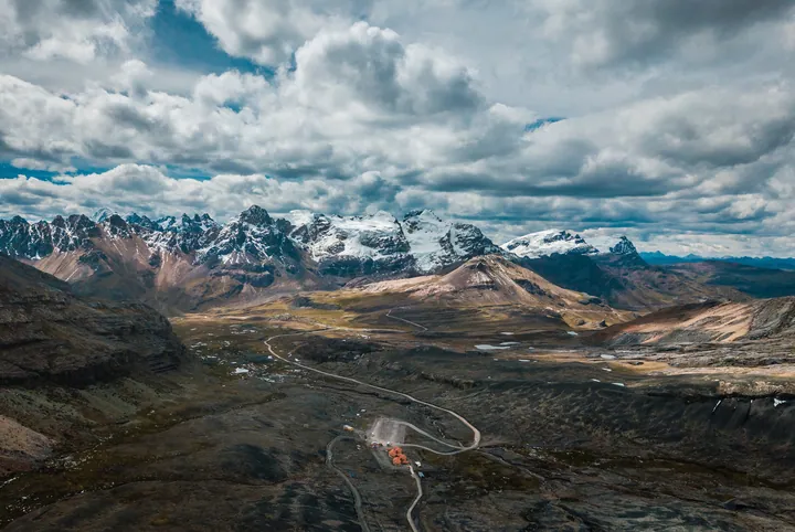 Aerial View Of Snowy Peaks And Clouds — original wallpaper