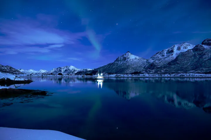 Aurora Over Frozen Lake And Boat wallpapers