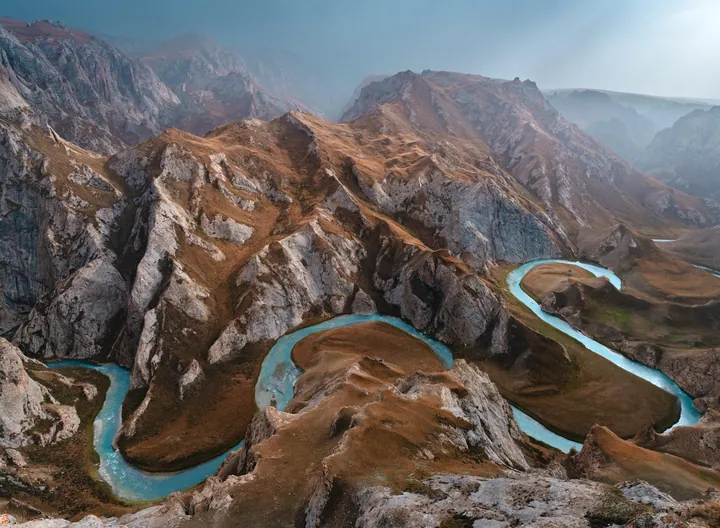 Valley River Winding Through Mountain Range wallpapers