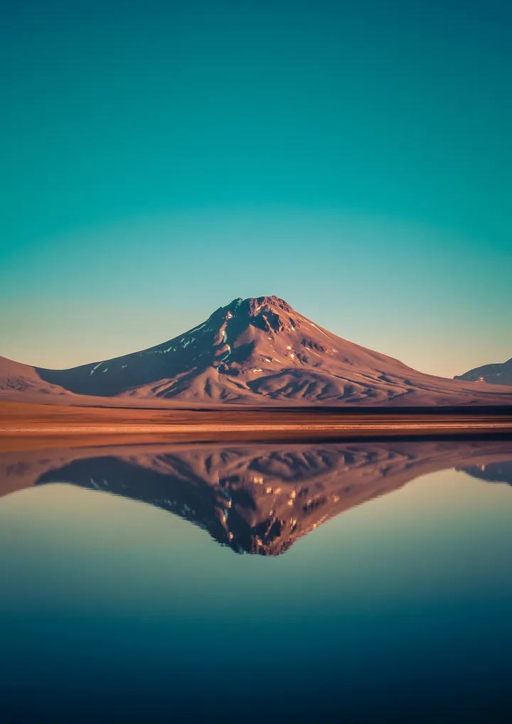 Mountain Reflection In Chilean Laguna Waters wallpapers
