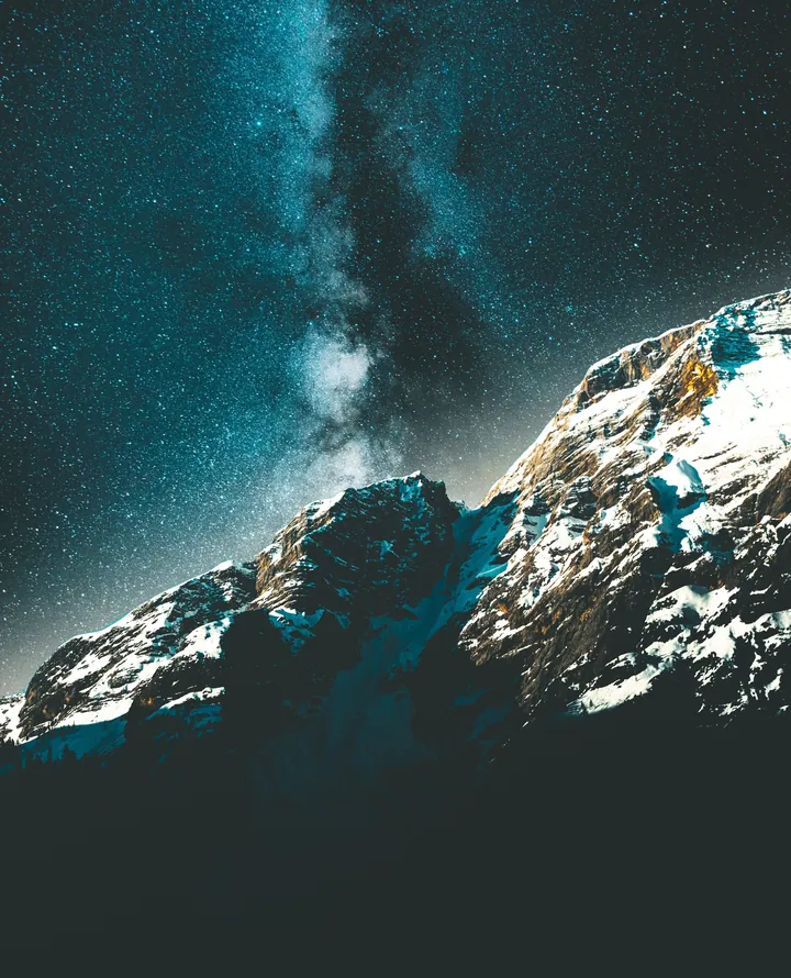 Snowy Rock Illuminated By Milky Way wallpapers