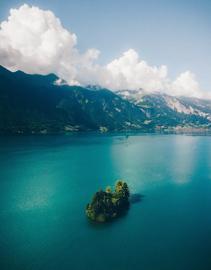 Cloudy Grindelwald Lake With Silver Mountains wallpapers