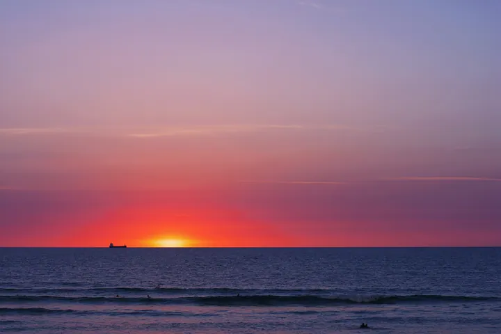 Ocean Sunset Horizon With Distant Boat wallpapers
