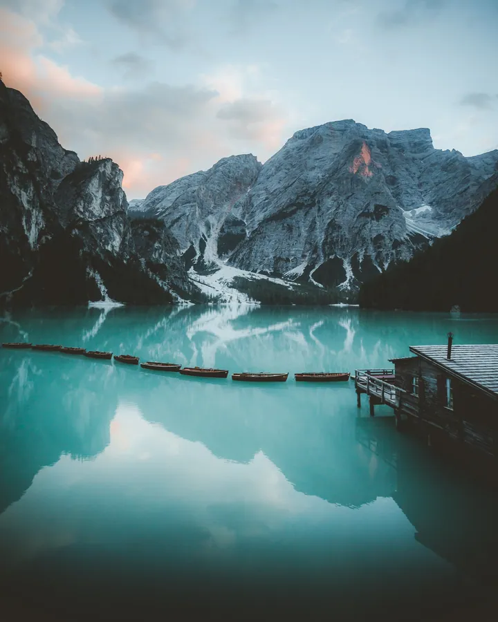 Snowy Mountain Lake With Rocks wallpapers